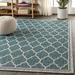 Gray 63 x 0.19 in Area Rug - Winston Porter Hague Geometric Teal Area Rug Polypropylene | 63 W x 0.19 D in | Wayfair