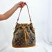 Dooney & Bourke Bags | Dooney & Bourke Bucket Shoulder Bag Purse Tote Cinch Heart Charm Tassels | Color: Brown/Tan | Size: Os