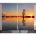 East Urban Home Lake House Single Tree over Still Lake Basin w/ Last Sun Rays on the Day Theme Graphic Print | 63 H in | Wayfair