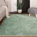 Green 60 x 1.5 in Indoor Area Rug - Ebern Designs Youssouf Solid Color Machine Made Tufted Polypropylene Area Rug | 60 W x 1.5 D in | Wayfair