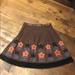 Anthropologie Skirts | Anthropologie Lithe Flower Skirt | Color: Black/Orange | Size: 2