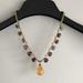 Anthropologie Jewelry | Anthropologie Necklace | Color: Brown/Yellow | Size: 16 Inches