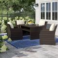 Wildon Home® Ammi 5 Piece Outdoor Dining Set w/ Cushions Metal in Brown | Wayfair 376094A327A0422CB5B9EF8ECFCDF2A9