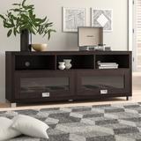 Winston Porter TV Stand for TVs up to 65" Wood in Brown | 23.5 H in | Wayfair ZIPC2195 26860597