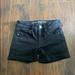 American Eagle Outfitters Shorts | American Eagle Black Midi Mid Rise Shorts | Color: Black | Size: 0