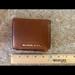 Michael Kors Bags | Michael Kors Wallet - Authentic | Color: Brown/Tan | Size: Os