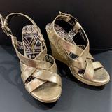 Jessica Simpson Shoes | Jessica Simpson Gold Tone Wedge Sandal | Color: Gold/Tan | Size: 8.5