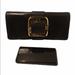 Michael Kors Bags | Michael Kors Black Leather Clutch W Gold Hardware. | Color: Black/Gold | Size: Os