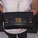 Michael Kors Bags | Michael Kors Astrid Leather Clutch | Color: Black/Gold | Size: 7"H X 12 1/2"W X 2"D