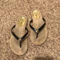 Michael Kors Shoes | Michael Kors Flip Flops | Color: Black/Gold | Size: 6