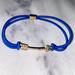 American Eagle Outfitters Jewelry | Blue Arrow Bracelet | Color: Blue/Gold | Size: Os