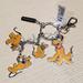 Disney Accessories | Disney Parks Retro Pluto Keychain | Color: Orange | Size: Os