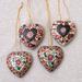 The Holiday Aisle® Heart Flowers Batik Wood 4 Piece Hanging Figurine Ornament Set Wood in Brown/Red | 3.9 H x 3.5 W x 1.2 D in | Wayfair