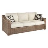 Ashley Furniture Beachcroft Patio Sofa in Beige