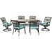 Hanover Monaco 7-Piece Patio Dining Set in Blue with 4 Dining Chairs 2 Swivel Rockers and a 40 x 68 Tile-Top Table