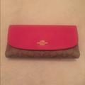 Coach Bags | Coach Tri-Fold Wallet Red/Coach C Design Nwt | Color: Brown/Red | Size: Os