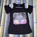 Jessica Simpson Tops | Jessica Simpson-Cold Shoulder Graphic Tee Xs | Color: Black | Size: Xs