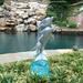 HomeStyles Life's a Beach Dolphin Nautical Statue Concrete/Stone in Brown | 13 H x 8.25 W x 4.25 D in | Wayfair 99476