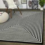 Black/White 63 x 0.55 in Area Rug - Corrigan Studio® Pangle Geometric Area Rug Polyester | 63 W x 0.55 D in | Wayfair