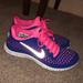 Nike Shoes | Blue & Pink Nike Athletic Training Shoes | Color: Blue/Pink | Size: 8