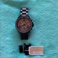 Michael Kors Accessories | Michael Kors Black Ceramic Watch Pink Glitter Face | Color: Black/Pink | Size: Os