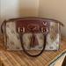 Dooney & Bourke Bags | Dooney And Bourke Medium Domed Satchel W/Tassel | Color: Brown/Tan | Size: Os