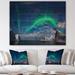 East Urban Home Aurora Borealis Above Flaget Bay - Unframed Photograph Print on Wood in Blue/Brown/Gray | 12 H x 20 W x 1 D in | Wayfair