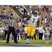 Leonard Fournette LSU Tigers Unsigned White Jersey Celebrating After Touchdown Photograph