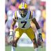 Tyrann Mathieu LSU Tigers Unsigned White Jersey Preparing for Play Photograph