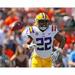 Clyde Edwards-Helaire LSU Tigers Unsigned White Jersey Reaction After Scoring Touchdown Photograph