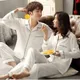 Pyjama de couleur unie en Satin de soie pour couple ensemble de pyjama Long à boutons pour femmes