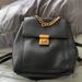 Michael Kors Bags | Michael Kors Mott Chain Backpack Gold-Toned | Color: Black | Size: 9 1/2w X 9h X 4-1/2 D
