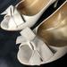 J. Crew Shoes | J. Crew Ivory Leather Peep Toe With Bow Heels | Color: Cream | Size: 8.5