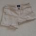 American Eagle Outfitters Shorts | American Eagle Tan Twill Midi Stretch Shorts | Color: Tan | Size: 0