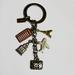 Coach Accessories | Coach Travel Mix Charm Keychain Fob Htf Nwot | Color: Gold/Silver | Size: Os