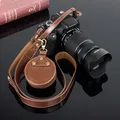 Étui de capuchon d'objectif en cuir PU pour appareil photo numérique sans miroir DSLR sangle