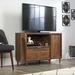 Millwood Pines Ausherman TV Stand for TVs up to 43" Wood in Brown | 30.38 H in | Wayfair DCA9039F94C64EC4BB507A5A297F12AF