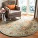 SAFAVIEH Handmade Heritage Britney Traditional Oriental Wool Rug