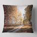 Designart 'Straight Road in Fall Birch Grove' Modern Forest Throw Pillow