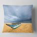 Designart 'Fishing Boat On Beach with Dark Clouds' Seashore Throw Pillow