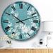 Designart 'Blue Cherry Blossoms I' Cabin & Lodge Wall CLock