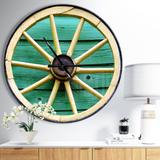 Designart 'Antique Wagon Wheel on Turquoise Wood' Oversized Farmhouse Wall CLock