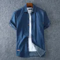 Chemises en Denim bleu clair pour hommes chemises en Jean à manches courtes en coton de haute