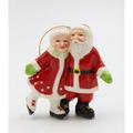 The Holiday Aisle® Santa & Mrs. Claus Skating Ornament Ceramic/Porcelain in Red | 4 H x 1.5 W x 3.625 D in | Wayfair