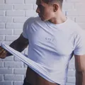 T-shirt décontracté blanc à manches courtes pour hommes chemise en coton de fitness pour hommes