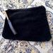 Urban Outfitters Bags | Asymmetrical Suede Wristlet | Color: Black | Size: Os