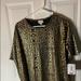 Lularoe Tops | Lularoe Xs Irma Black And Gold Foil Top | Color: Black/Gold | Size: Xs