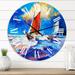 Designart 'Sailships On The Ocean Waves During Sunset' Nautical & Coastal wall clock