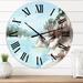 Designart 'Rocks By The Blue Lake' Lake House wall clock