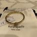 Kate Spade Jewelry | Brand New Kate Spade “All Tied Up” Bangle. | Color: Gold | Size: Os